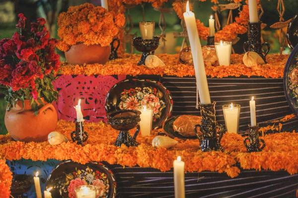 What is placed on a Day of the Dead altar?